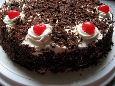 where can i order a yummy birthday cake(black forest- preferably) and b’day gift.?