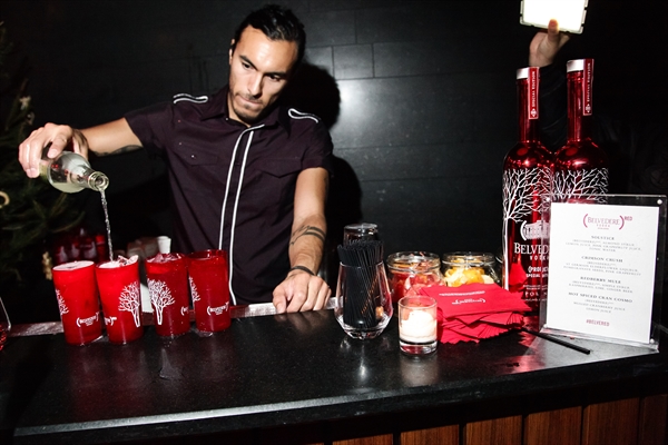 What is a typical hourly wage paid to bartenders, excluding tips?